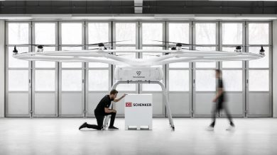 Heavy-lift logistics cargo drone with two people