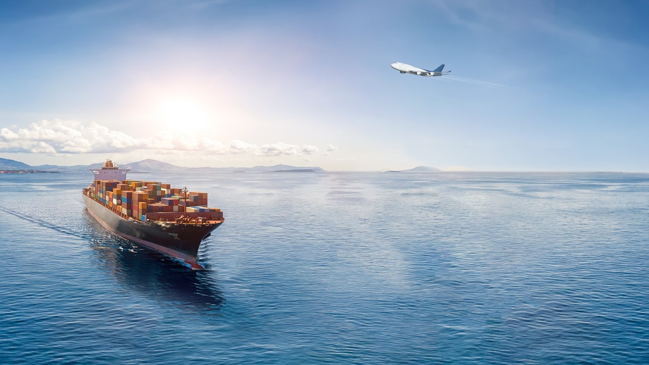 Ship on the Ocean and air plane at the sky